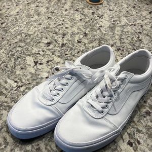 White canvas Vans lace ups